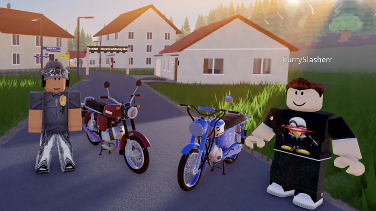 A police officer in uniform standing beside a red moped and a blue Simson S51 on a German village street